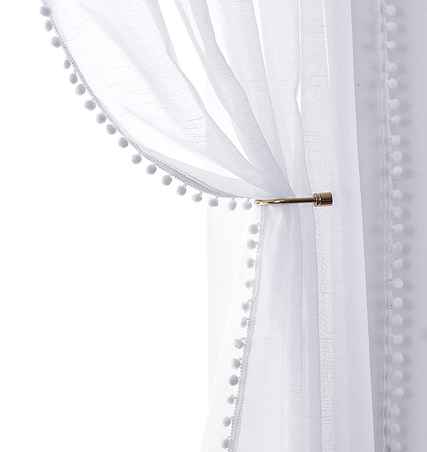 Boho curtains made of transparent voile, decorated with pompoms and tassels, eyelet…
