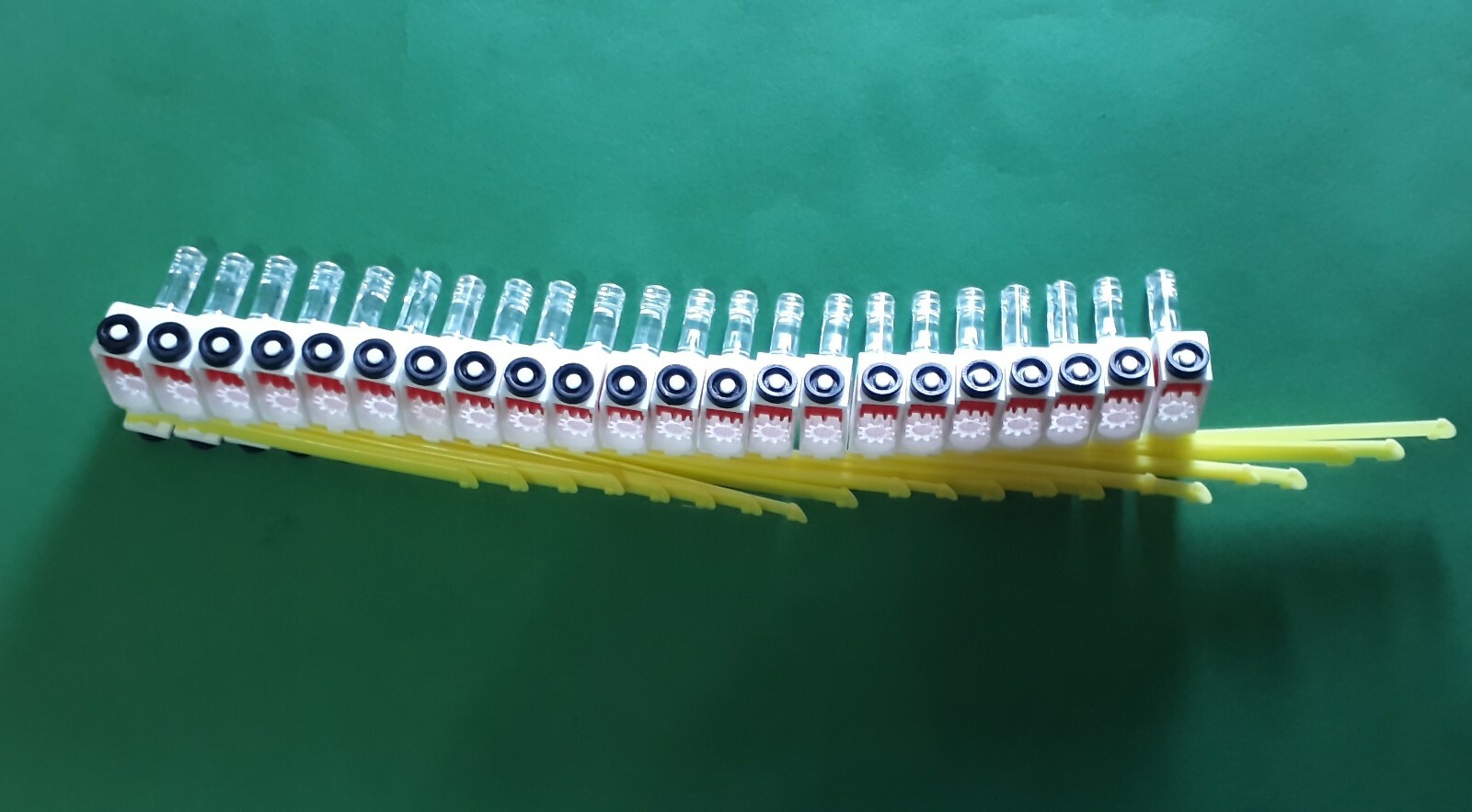 25 Carriers in a Roll with 73mm Plastic Spacer for Vertical Blinds/Shades